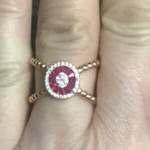 Elegant Rose Gold and Red Gemstone Ring